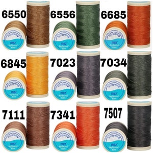 May include: Assortment of 10 spools of thread in various colors, including brown, green, orange, and gray. Each spool is labeled with the brand name "mez" and the text "Nylbond" and "60m".