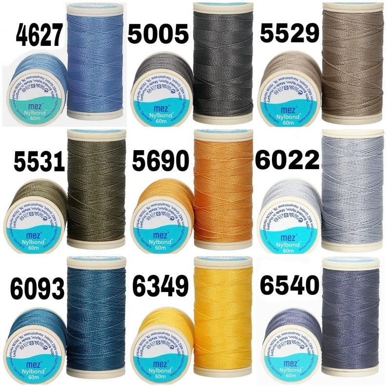 May include: Nine spools of thread in various colors, including blue, gray, brown, green, orange, yellow, and silver. Each spool is labeled with the brand name "mez Nylbond" and the length "60m".