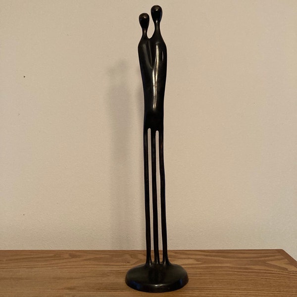 1980s modernist Bronze Sculpture by female Swedish sculptor Louise Hederström "Two become one”.  A beautiful sleek minimalist modern piece.