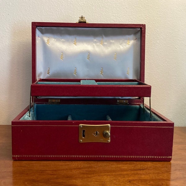 Fantastic upscale 1960s large Vintage jewelry box made of Mele burgundy red Leather with gold scrolled tooling & lush velvet interior. MCM