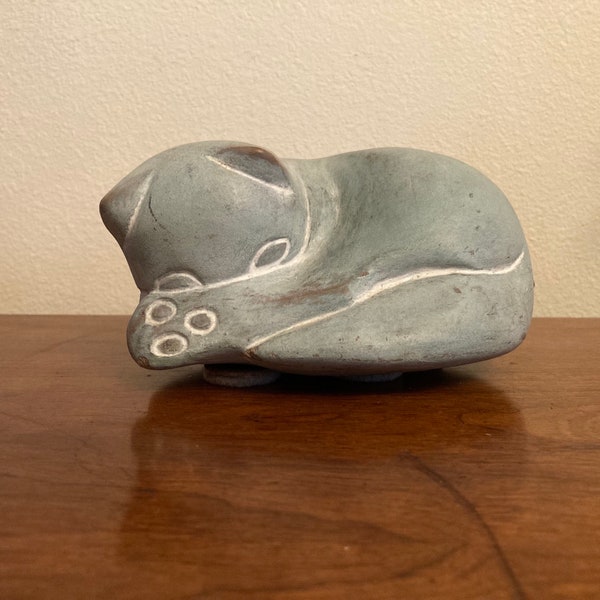 Vintage  heavy clay or cement material sculpture door stop paper weight of a curled up sleeping kitty made by Isabel Bloom Signed .