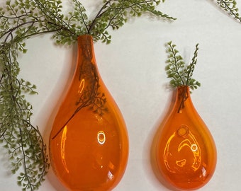 Fab pair of vintage art glass 3D bright orange teardrop wall pocket vases, a perfect addition to any Swung vase or genie bottle collection!