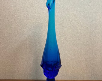 1960s stunning Fenton Valencia Colonial cobalt Blue glass swung bud Vase with flower shaped pedestal base. Beautiful in the sunlight!