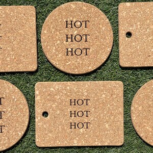 May include: A set of six light brown cork coasters in circular and rectangular shapes. Each coaster features the word HOT printed three times in a stacked black font. Two of the rectangular coasters include a small circular hole near one edge.