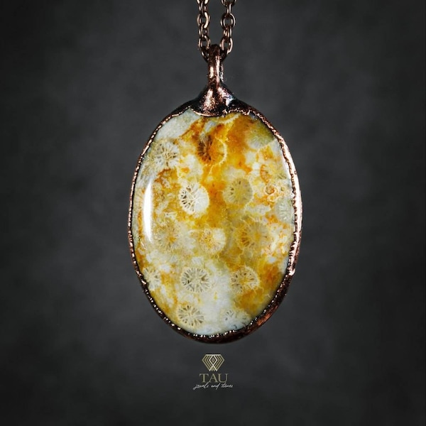 Pendant with yellow fossil coral, in antique gilded copper, made in Italy