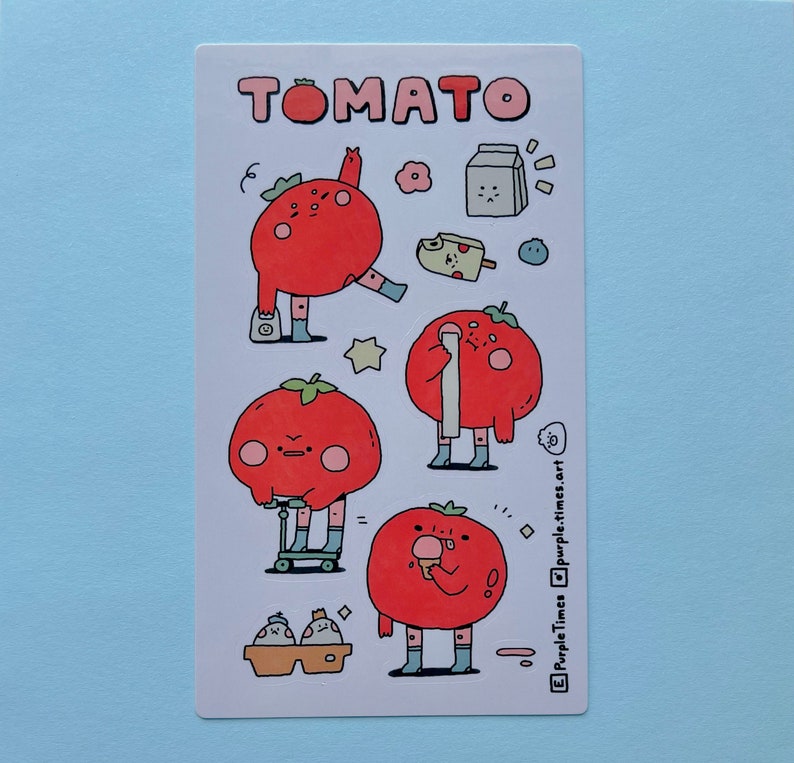 May include: A sheet of stickers featuring cartoon tomatoes in various poses. The stickers are white with black outlines and red tomatoes. The text "TOMATO" is at the top of the sheet. The text "PurpleTimes @purpletimes.art" is at the bottom of the sheet.