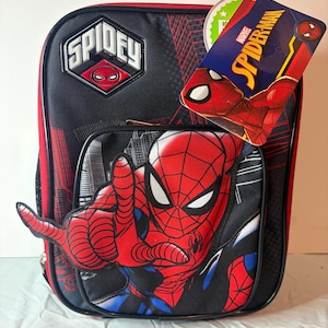 May include: Black and red Spidey backpack featuring a large Spider-Man graphic with outstretched hand. The backpack has the word "SPIDEY" on the top and a Marvel Spider-Man tag attached. The design includes a cityscape and web patterns.