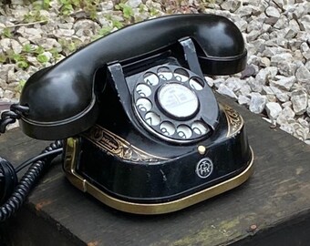 Vintage telefoon RTT-56 Een telefoon volledig metaal en bakeliet zwart, volledig werkend