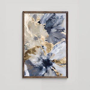May include: Abstract painting with a wood frame. The painting features a swirling pattern of white, gray, and gold paint.