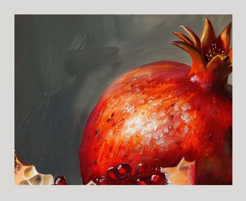May include: A close-up of a red pomegranate with a white, textured surface. The pomegranate is partially cut open, revealing the red seeds inside.