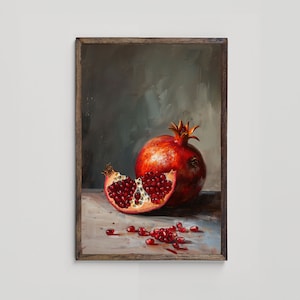 May include: A still life painting of a red pomegranate with some of the seeds removed, sitting on a wooden table with a brown background.