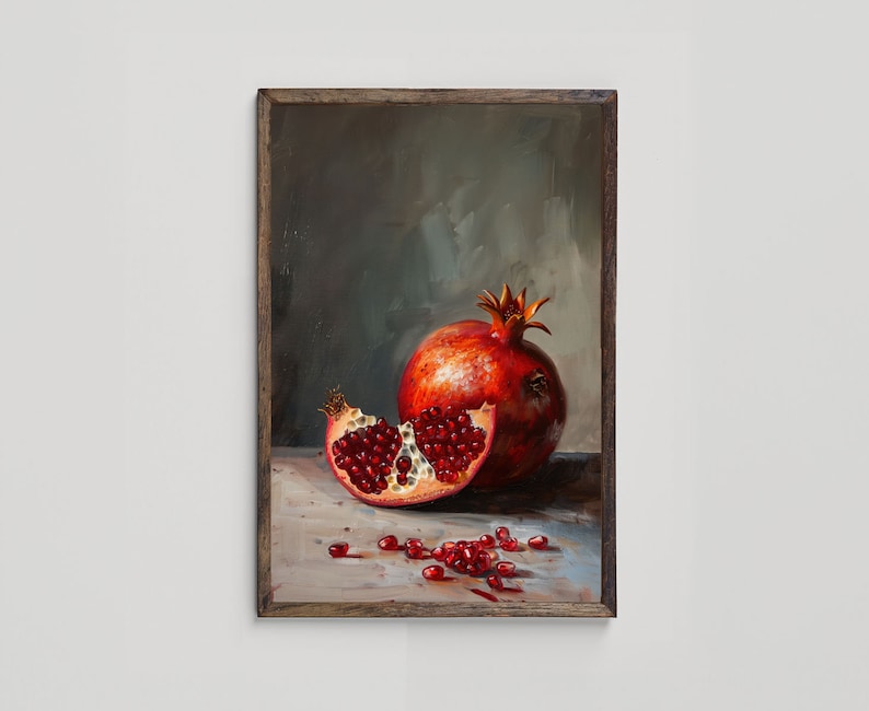 May include: A still life painting of a red pomegranate with some of the seeds removed, sitting on a wooden table with a brown background.