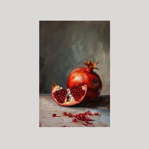 May include: A still life painting of a red pomegranate with some of the seeds scattered on a light brown surface.