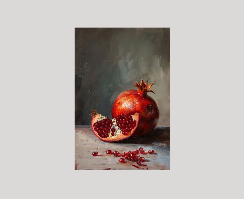 May include: A still life painting of a red pomegranate with some of the seeds scattered on a light brown surface.