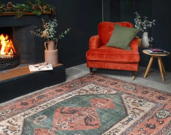 Tappeto da salotto tradizionale in terracotta verde, bordato in stile boho persiano, lavabile