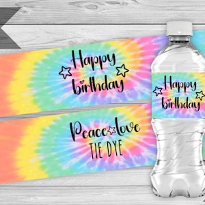 May include: Two tie-dye patterned water bottle labels with the text "Happy birthday" and "Peace love tie dye". The labels are 2x8 inches.