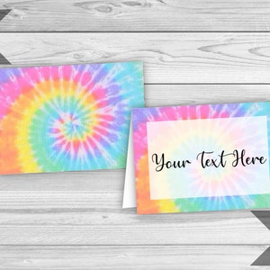 May include: Two printable cards with a tie-dye pattern. The first card has a full tie-dye pattern. The second card has a tie-dye border with a white rectangle in the center that says "Your Text Here".
