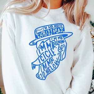 May include: White sweatshirt with blue text that reads "I'm Mr. White Christmas, I'm Mr. Snow Icicle, I'm Mr. 10 Below."