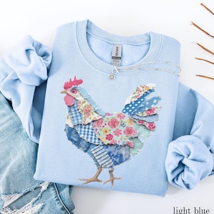 May include: A handmade wooden sign with the text "Welcome to our home" in a handwritten style. The sign is painted white with black lettering and a distressed finish, perfect for home decor.