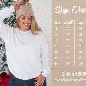 May include: Size chart for a Gildan 18000 Heavy Blend Crewneck Sweatshirt. The chart shows the width, length, and sleeve length in inches for sizes S through 4XL.