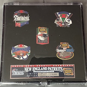 New England Patriots Super Bowl 38 Champions commemorative pin set . TOM BRADY ! Limited to 10,000 sets . This is # 502 !
