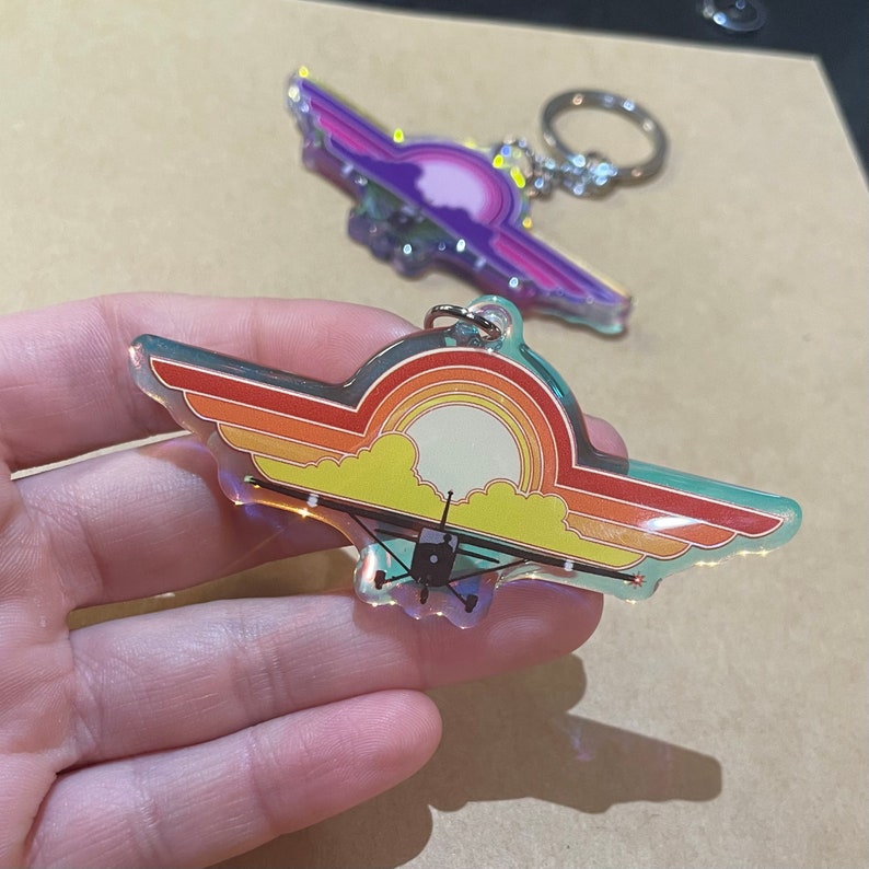 Fly Icon Keychain Cessna 172 Keychain With Airplane Soaring Through Dusk Sky - Aviation ...