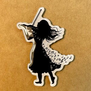 May include: A black silhouette of a person playing a violin with musical notes trailing behind them. The image is printed on a clear acrylic background.