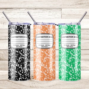 May include: Three stainless steel tumblers with a composition notebook design. The tumblers are black, orange, and green. Each tumbler has the text "COMPOSITION BOOK" and "100 Sheets 200 Pages Wide Ruled" printed on it.
