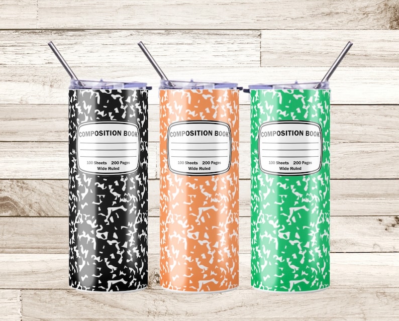 May include: Three stainless steel tumblers with a composition notebook design. The tumblers are black, orange, and green. Each tumbler has the text "COMPOSITION BOOK" and "100 Sheets 200 Pages Wide Ruled" printed on it.