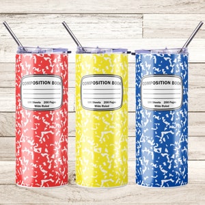 May include: Three stainless steel tumblers with a composition notebook design. The tumblers are red, yellow, and blue. Each tumbler has the text "COMPOSITION BOOK" and "100 Sheets 200 Pages Wide Ruled" printed on it.