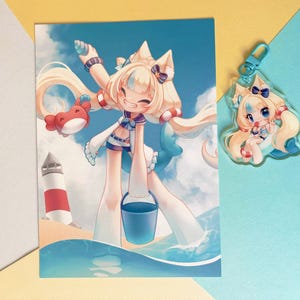 May include: A vibrant illustration and an acrylic charm featuring a cartoon character with long blonde hair, blue eyes, and a beach-themed outfit. The illustration shows the character on a beach with a lighthouse and a crab.