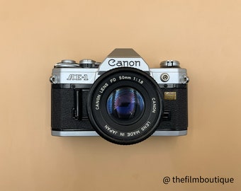 Canon AE-1 with 50mm f1.8 Fd lens Light meter works (read)