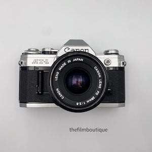 Canon AT-1 35mm SLR camera with Canon 28mm 2.8 lens