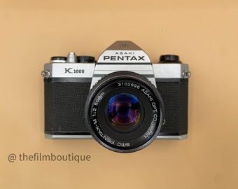 Pentax K1000 SLR Film Camera + SMC Pentax 50MM f2.0 (tested with film and working/light meter works!)