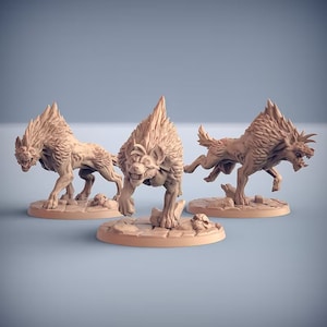 May include: Three miniature painted figures of hyenas, each with a different pose, standing on a circular base. The hyenas are a light brown color and have detailed fur and teeth.