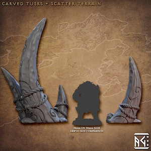 May include: Two gray, carved tusk-shaped terrain pieces with rope details. The pieces are 38mm tall and are shown next to a miniature figure for scale. The text "38mm ON 30mm BASE ORRUG SIZE COMPARISON" is printed below the image.