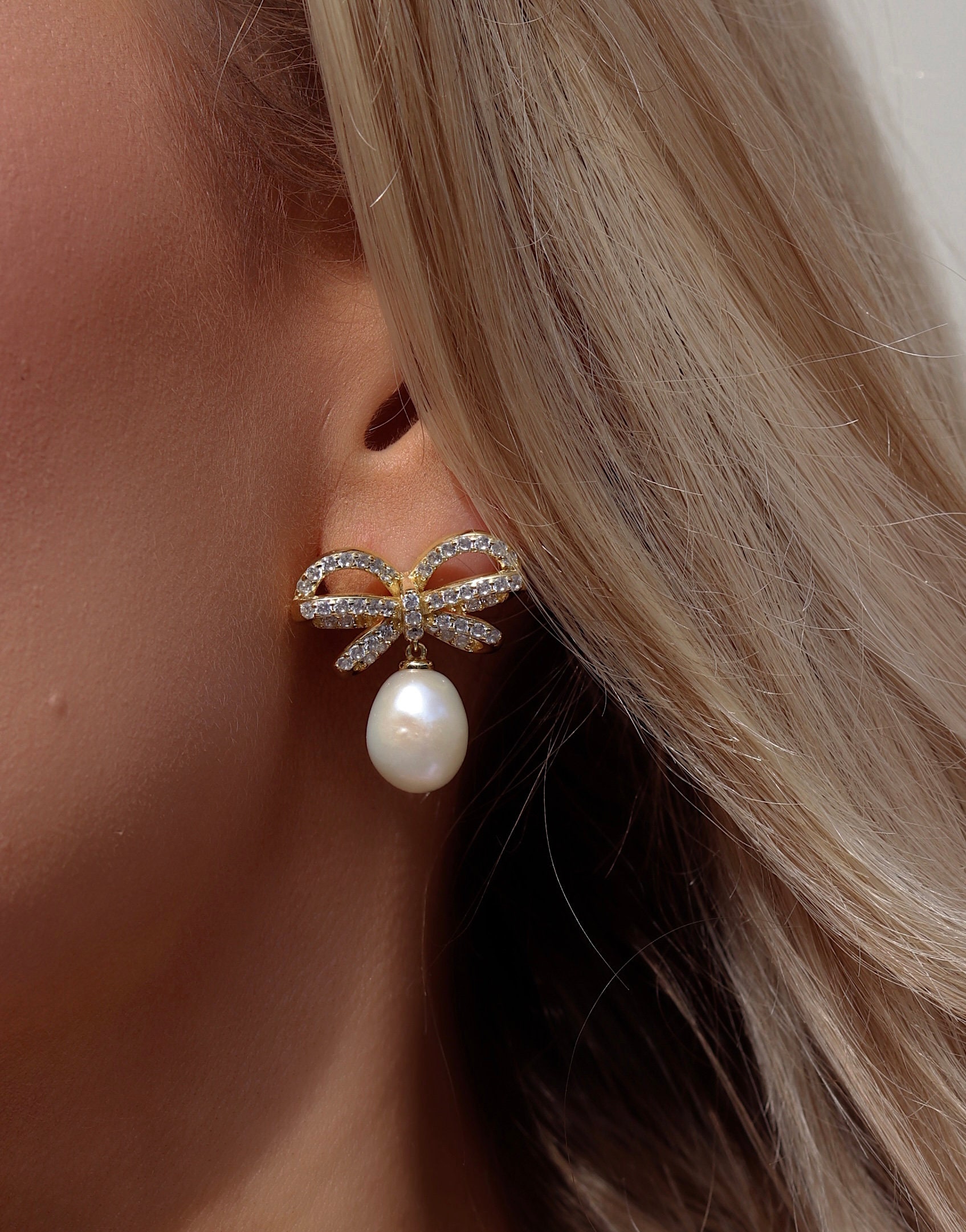 Bow pearl best sale earrings