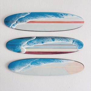 Set of three mini resin surfboard