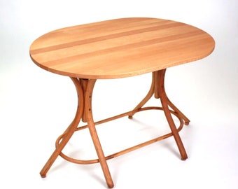 Bentwood table made of beech with solid wood table top, as a kitchen table, small dining table, side table.Bentwood table made of beech