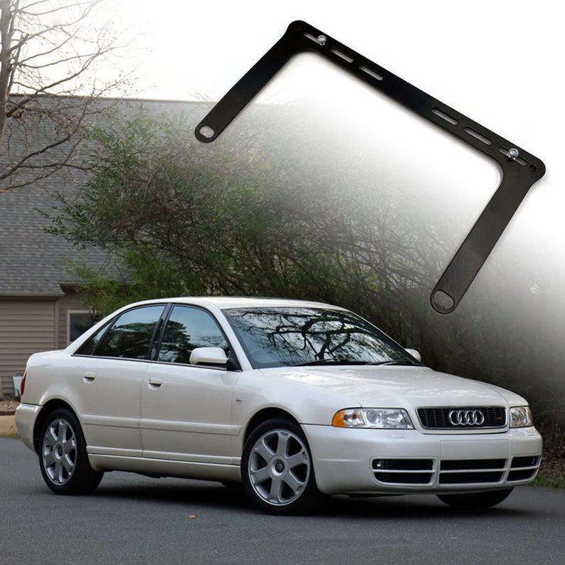Fire extinguisher holder bracket for cars, shown above Audi A4 for automotive interior mounting.