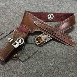 ウエスタンレザーカートリッジベルト、弾薬ループとハンマーストラップ付き、リボルバーホルスターガンカバーを固定します。.22 .32 .357 .38 .44 .45
