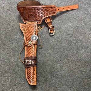 カウボーイアクションカートリッジベルト 弾薬ホルスター付き コルトサスリグ .22 .357 .38 .44 .45 & 12ゲージ