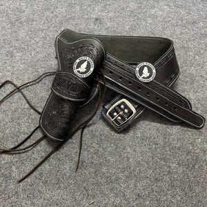ウエスタンレザーカートリッジベルト、弾薬ループとハンマーストラップ付き、リボルバーホルスターガンカバーを固定します。.22 .32 .357 .38 .44 .45