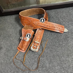 ウエスタンレザーカートリッジベルト、弾薬ループとハンマーストラップ付き、リボルバーホルスターガンカバーを固定します。.22 .32 .357 .38 .44 .45