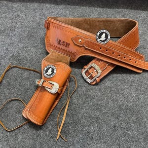 ウエスタンレザーカートリッジベルト、弾薬ループとハンマーストラップ付き、リボルバーホルスターガンカバーを固定します。.22 .32 .357 .38 .44 .45