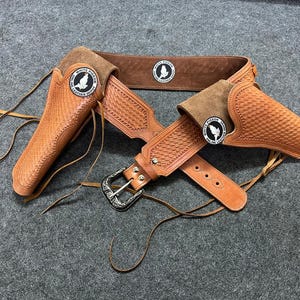 ウエスタンレザーカートリッジベルト、弾薬ループとハンマーストラップ付き、リボルバーホルスターガンカバーを固定します。.22 .32 .357 .38 .44 .45