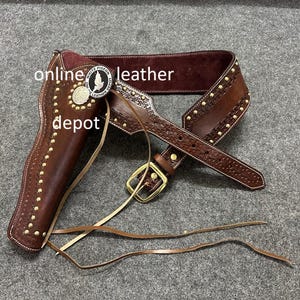 ウエスタンレザーカートリッジベルト、弾薬ループとハンマーストラップ付き、リボルバーホルスターガンカバーを固定します。.22 .32 .357 .38 .44 .45