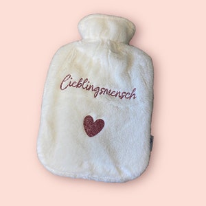 Cozy hot water bottle with a personal print, e.g. favorite person image 1