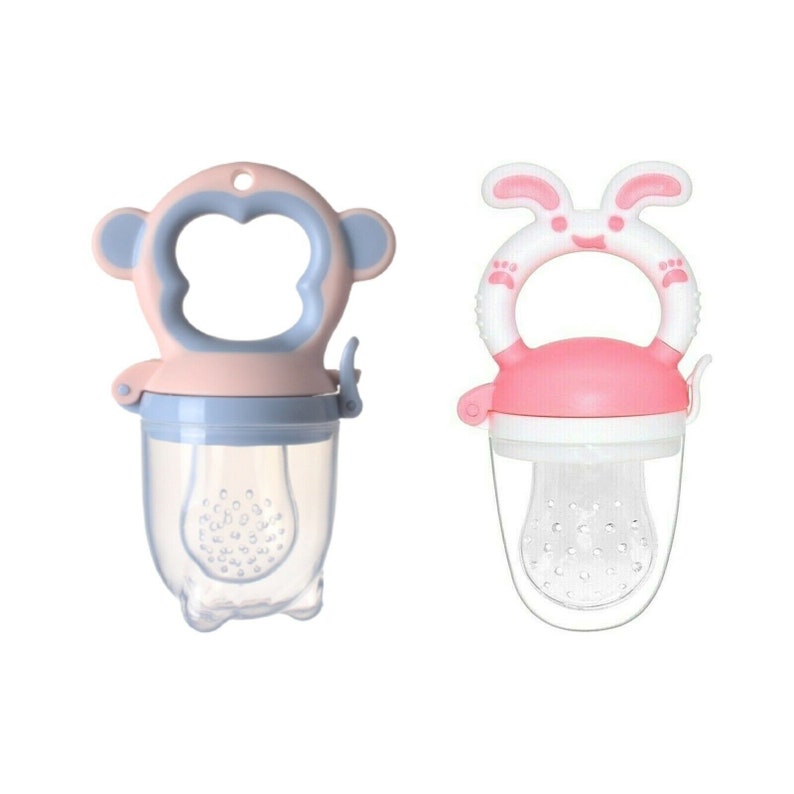 May include: Two silicone baby food feeders, one shaped like a monkey and the other shaped like a bunny. Both feeders have a clear plastic container with a mesh insert and a pink silicone top.