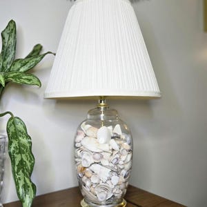 Vintage Glass Jar Table Lamp filled with Seashells and Seahorse with Vintage Cream Pleated Lamp Shade 21&quot;
